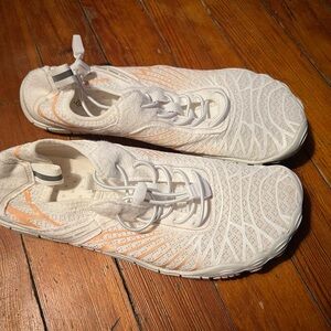 White Lightweight Slip-On Athletic Sneakers with Peach Accent